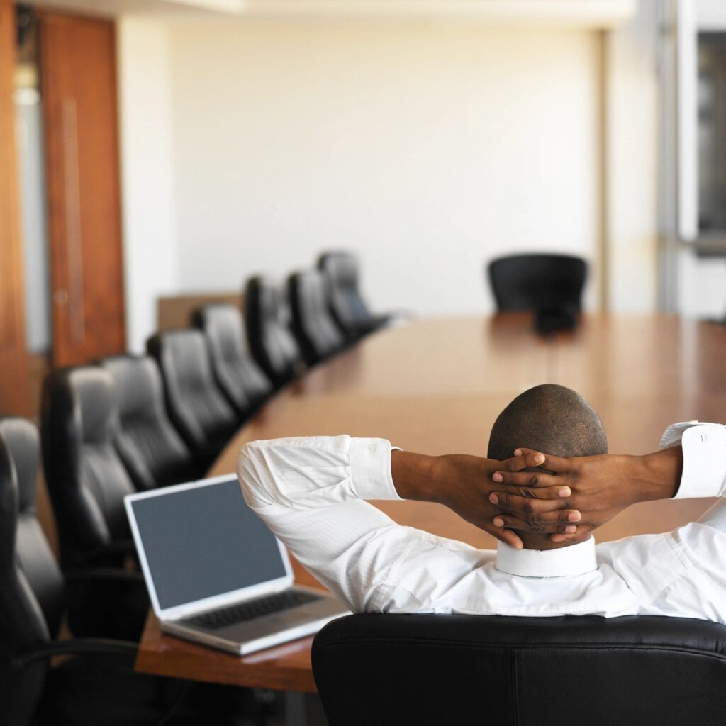 Relaxed man in meeting room